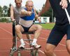 passing-baton-wheelchair-ol.jpg