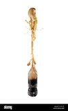 mentos-fountain-an-eruption-of-foam-after-a-mentos-candy-was-dropped-C66CTR.jpg