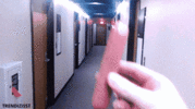 throwing-hotdog-down-a-hallway-tight.gif