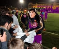 DP signing autographs.png