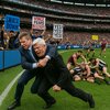 Vince McMahon spear tackling Eric Bischoff on the_.jpg