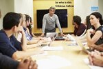 male-boss-addressing-meeting-around-boardroom-table-looking-colleagues-having-discussion-38631...jpg
