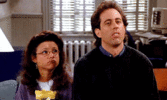 Elaine-Benes-and-Jerry-Seinfeld-Shrug.gif