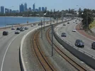 Perth_skyline_and_Kwinana_Freeway_2009.webp