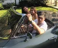 Hunter driving with young girls.webp