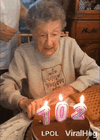 grandma's-fake-teeth-flew-out-when-blowing-a-candle-viralhog.gif