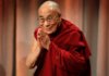 1.-Tibets-exiled-spiritual-leader-the-Dalai-Lama-greets-an-audience-in-Boston-e1352778423892.jpg