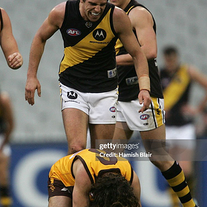 Window_and_Tim_Fleming_for_Richmond_stands_over_a_downed_Mark_Williams_for____News_Photo_-_Get...png