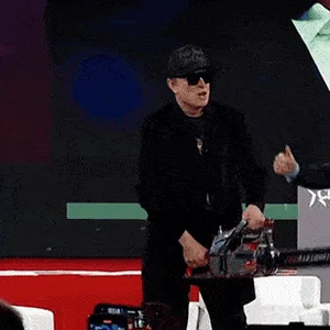 elon-musk-chainsaw.gif