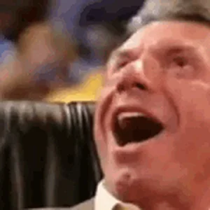vince-mc-mahon-having.gif